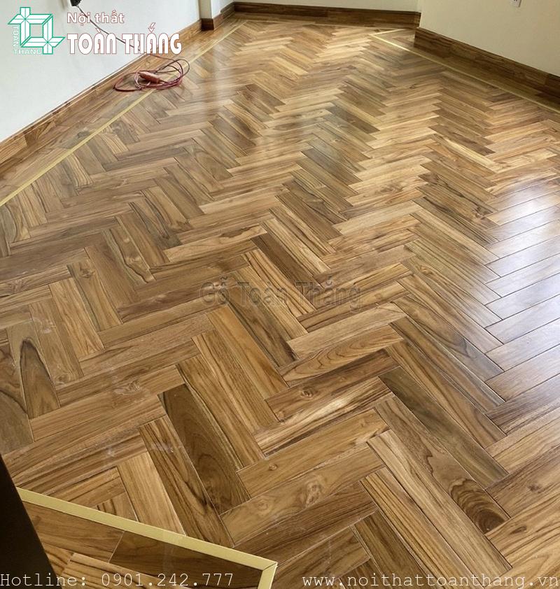 Sàn gỗ Giá tỵ Lào lắp phòng ngủ bằng kiểu xương cá
